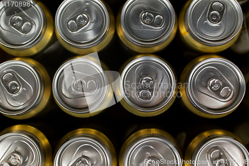 Image of close up of cans with drinks