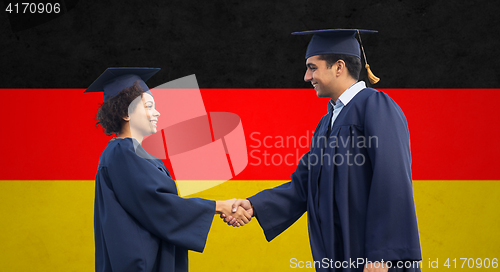 Image of happy students or bachelors greeting each other