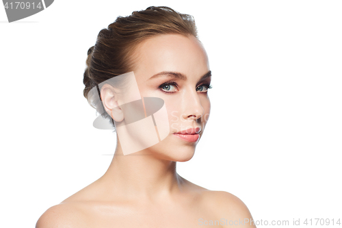 Image of beautiful young woman face over white background