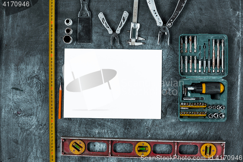 Image of The set of construction tools on wooden table