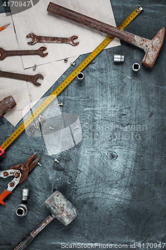 Image of The set of construction tools on wooden table