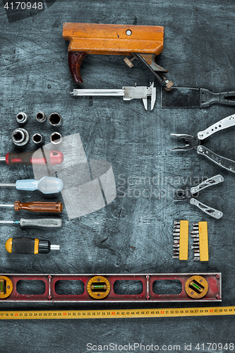 Image of The set of construction tools on wooden table