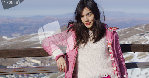 Image of Attractive young woman on ski holiday