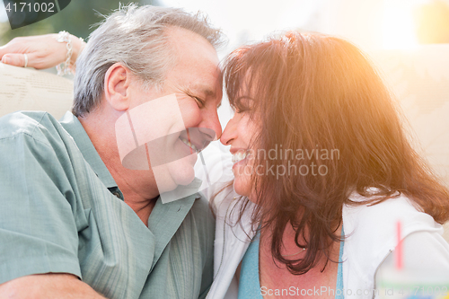 Image of Happy Middle Aged Couple Enjoy A Romantic Moment Outside