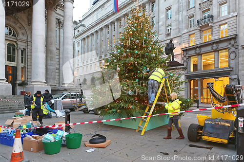Image of Decorating Christmas Tree in City