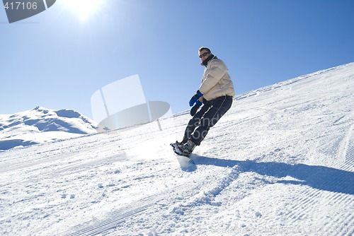 Image of Snowboarding in the sun stock photo