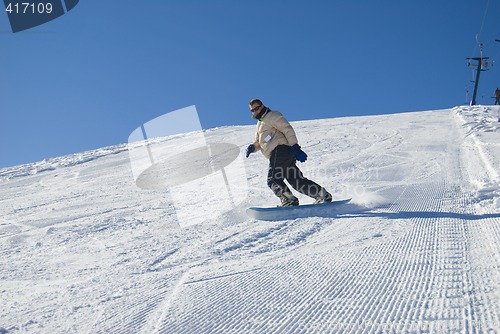Image of Man snowboarding stock photo