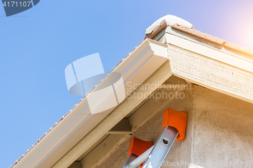 Image of House with New Seamless Aluminum Rain Gutters.
