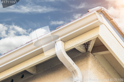 Image of House with New Seamless Aluminum Rain Gutters.