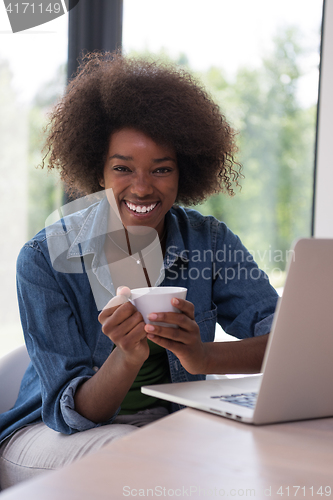 Image of African American woman in the living room