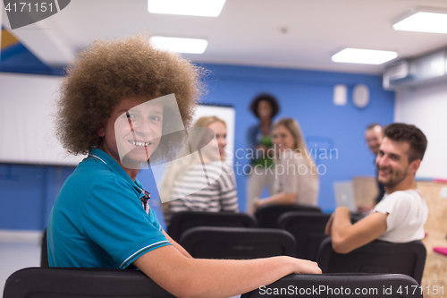 Image of Portrait of young informal businessman