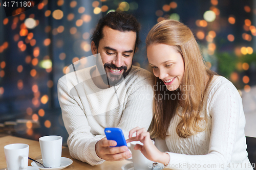 Image of happy couple with tablet pc and coffee at cafe