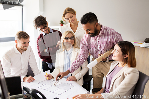 Image of business team discussing house project at office