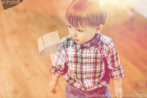 Image of happy little baby boy at home