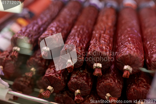 Image of salami sausage at grocery store stall