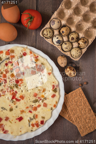 Image of baked omelette with different eggs