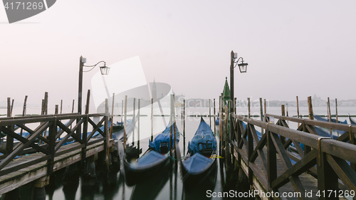 Image of Gondolas at their moorings in Venice, Veneto, Italy, Europe