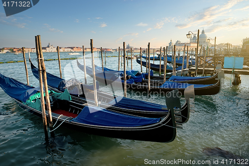 Image of Venetian gondolas at sunset