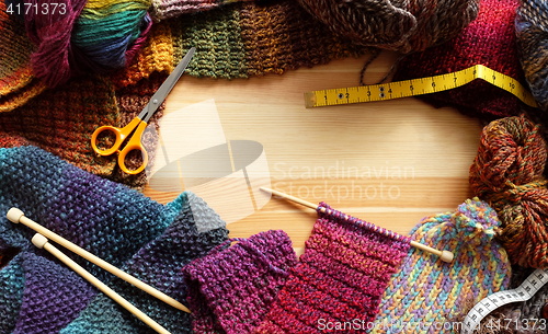 Image of Border of colourful knitting and craft accessories