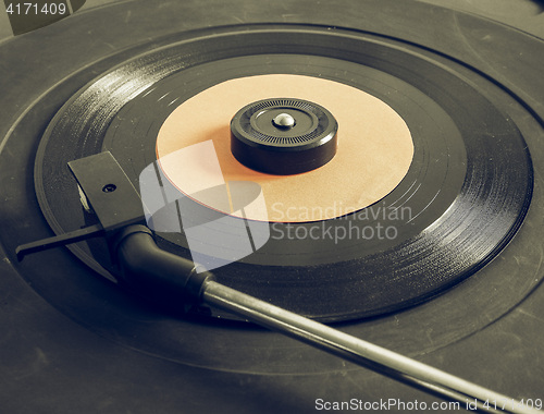 Image of Vintage looking Vinyl record on turntable