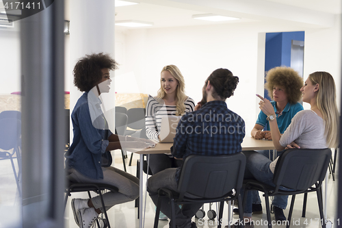 Image of Multiethnic startup business team on meeting