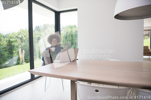 Image of African American woman in the living room