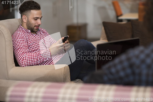 Image of Portrait of young informal businessman