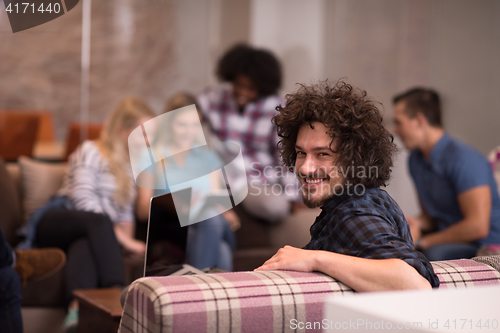 Image of Portrait of young informal businessman