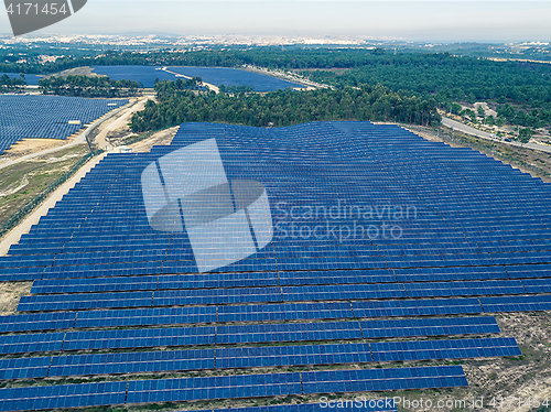 Image of Aerial View Over Solar Panel Farm