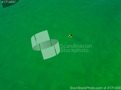 Image of Surfer Rest on the Surface of the Ocean