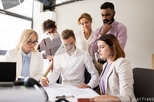 Image of business team discussing house project at office