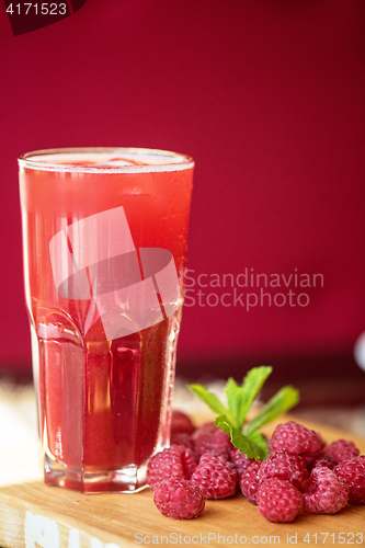 Image of fruit drink with raspberries
