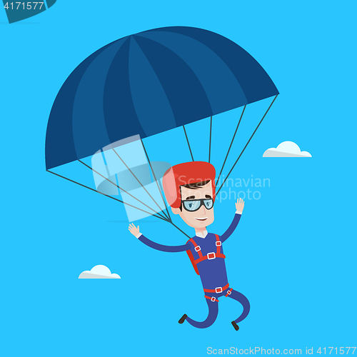 Image of Young happy man flying with parachute.