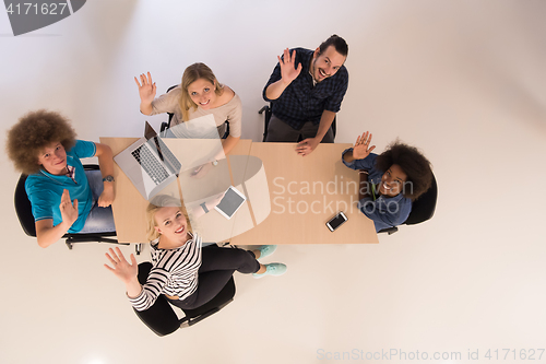 Image of Multiethnic startup business team on meeting  top view