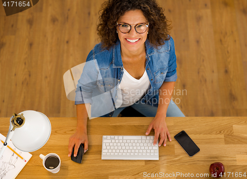Image of Businesswoman working at the office