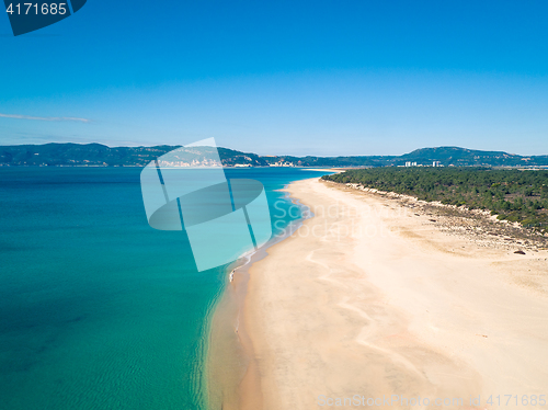 Image of Aerial View Empty Sandy Beach with Small Waves