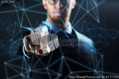 Image of businessman with virtual network hologram