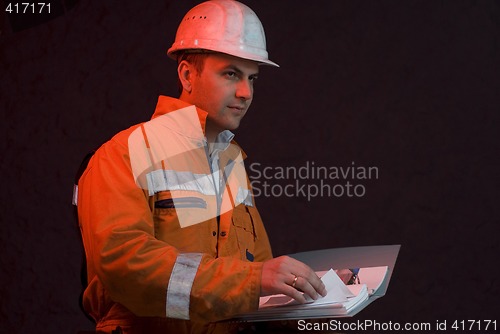 Image of Chief miner checking the progress