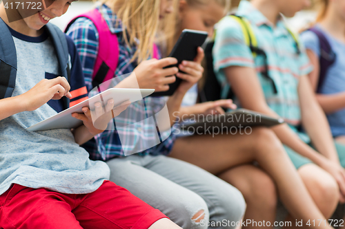 Image of close up of elementary students with tablet pc