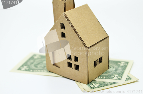 Image of Paper house model and money