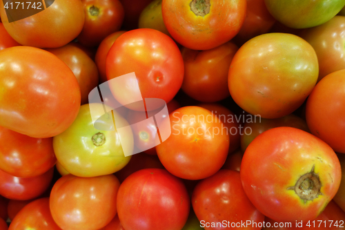 Image of Red tomatos display in the market