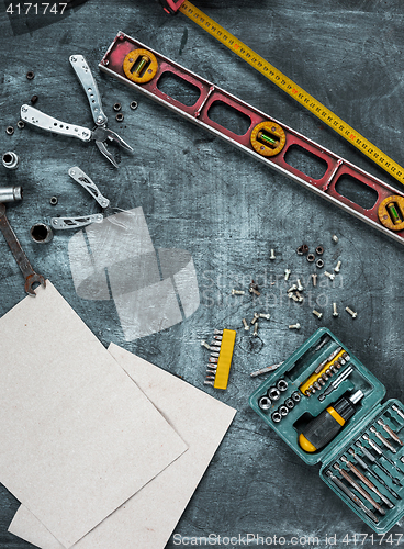 Image of The set of construction tools on wooden table