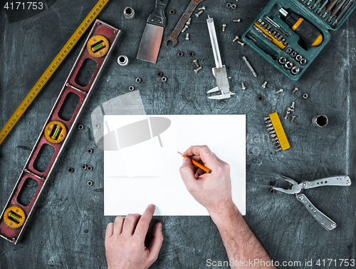 Image of The set of construction tools on wooden table