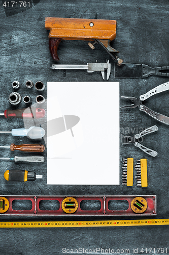 Image of The set of construction tools on wooden table