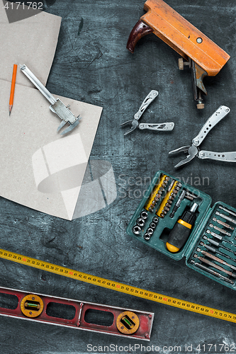 Image of The set of construction tools on wooden table