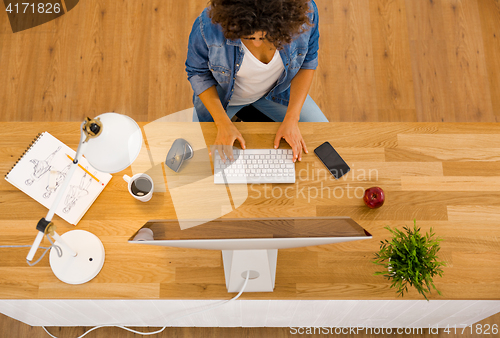 Image of Businesswoman working at the office