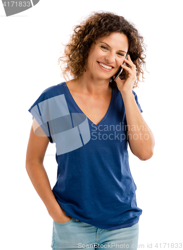 Image of Happy woman talking at phone