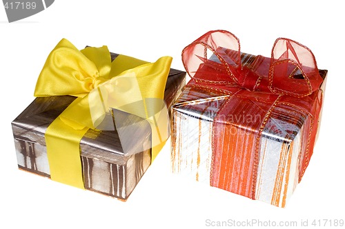Image of Presents with red ribbon isolated on white background