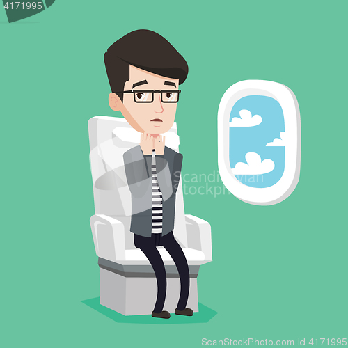 Image of Young man suffering from fear of flying.