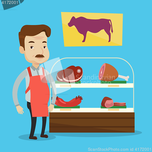 Image of Butcher offering fresh meat in butchershop.